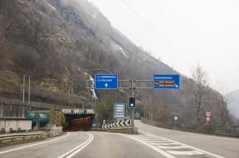 A traffic light on the fork of the highway. Photos