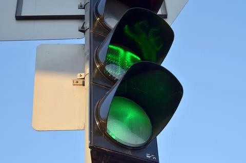 Traffic light GO with a timer and a green light turned on Stock Photos