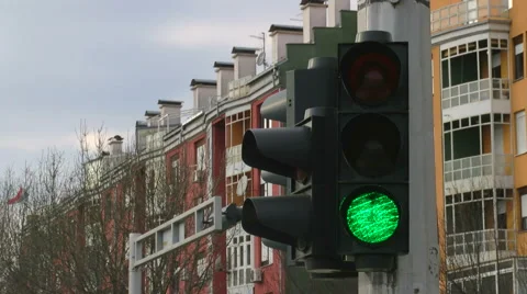 Traffic light goes from green to red Stock Footage