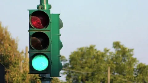 Traffic light from green to red Stock Footage 69210633