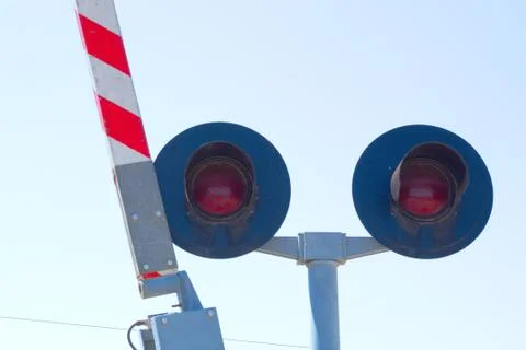 Traffic light indicating level crossing to warn of the passing of trains Stock Photos