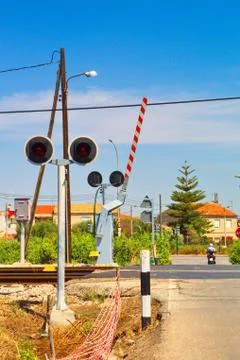 Traffic light indicating level crossing to warn of the passing of trains Stock Photos