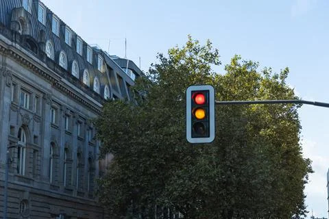 Traffic light at an intersection in the city Stock Photos