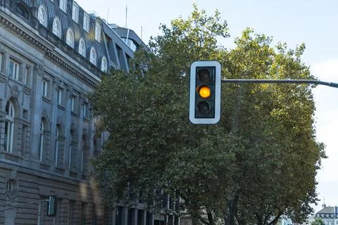 Traffic light at an intersection in the city Stock Photos