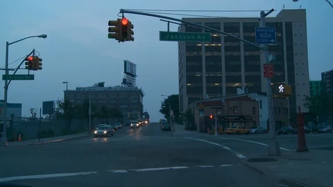 Traffic light on Jackson Ave in Long Island City with Ferry signage, night. Video stock 109916818
