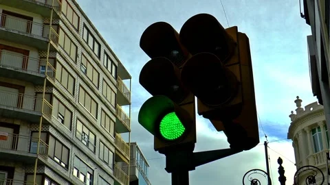 A traffic light in Orihuela changes from red to green. Stock Footage 152855742