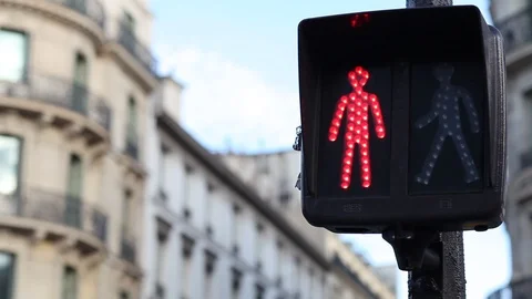 Traffic light for pedestrians changing from red to green on the street Stock Footage 98100300