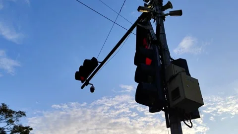 Traffic Light on Pole Against Clear Sky During Twilight Video stock 309841846