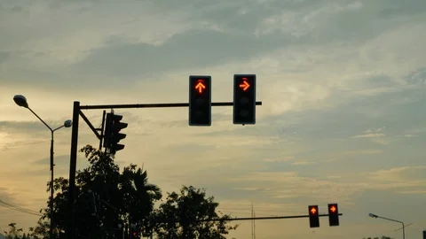 Traffic light red change green, scene with orange dusk sky background Stock Footage 89250383