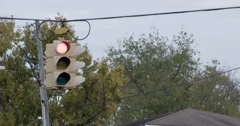 Traffic Light - Red to Green 4K Stock Footage 87956639