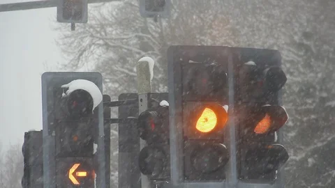 Traffic light Red to Green change in snow Stock Footage 86621015