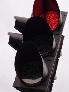 A traffic light with a red light on Stock Photos