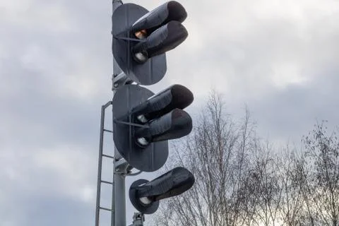 Traffic light to regulate railway traffic. Stock Photos