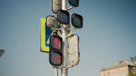 Traffic Light Showing Red with Countdown Timer from 68 Seconds in City Crossing Video stock 305528317