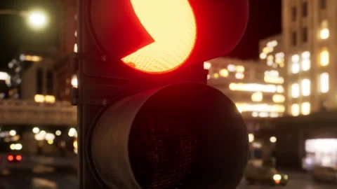 Traffic light shows red light at night in city Stock Footage 343939670