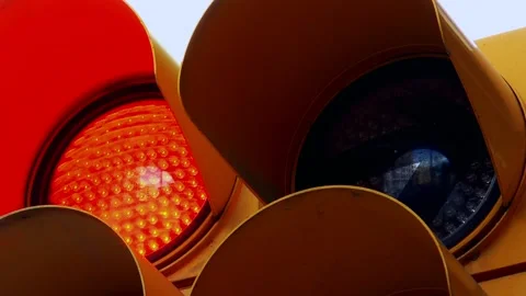 The traffic light shows red. Then the yellow light starts blinking. Stock Footage 152855747