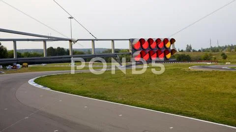 Traffic light on sport track Stock Photos
