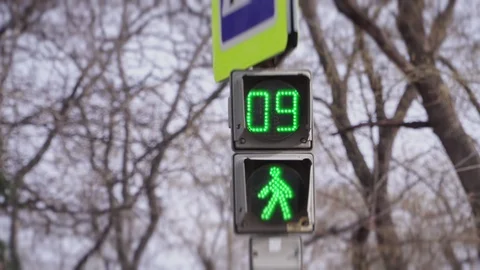 Traffic light on the street on a blurred background Stock Footage 101818683