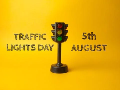 Traffic light with text TRAFFIC LIGHT DAY 5TH AUGUST Stock Photos