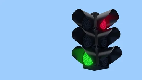 A traffic light with three on blue sky background with Looped Seamless Video stock 129166110