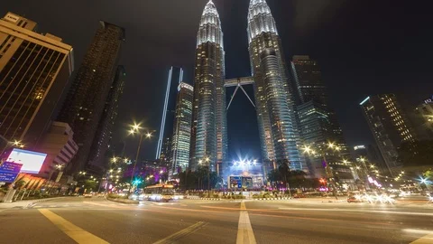 Traffic Light Trails At Intersection In Front Of KLCC. Timelapse Pan Right Video stock 106762806