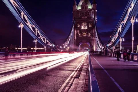 Traffic light trails on Tower Bridge in London at night Stock Photos