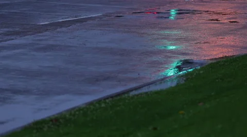 Traffic Light turning green in a puddle Stock Footage 49564983