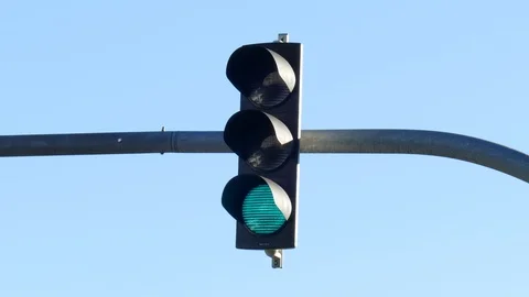 Traffic light turns from red to green, Blue Sky,  Germany Stock Footage 124364356