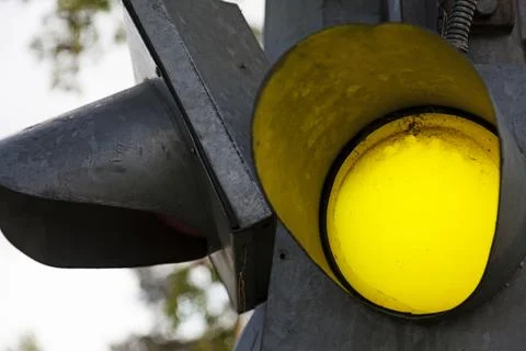 Traffic light that is yellow Stock Photos