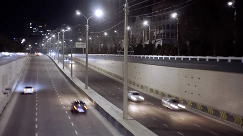 Traffic on a lighted highway, time lapse Stock Footage 236714808