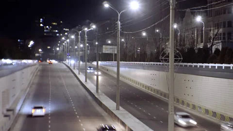 Traffic on a lighted highway, timelapse Stock Footage 239619880