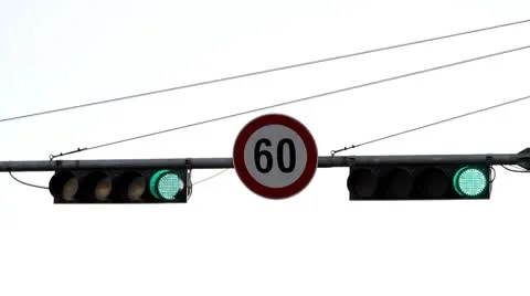 Traffic lights and speed limit sign Stock Footage 8924850