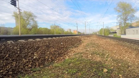 Traffic lights and train on rails in the spring timelapse Stock Footage 82987922