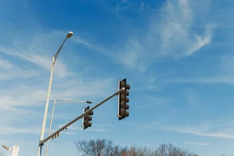 Traffic lights are located at an intersection with no vehicles passing by. Th Stock Photos