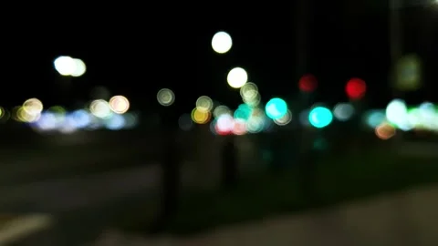 Traffic lights in blur at a highway intersection at night at dusk Stock Footage 282203162