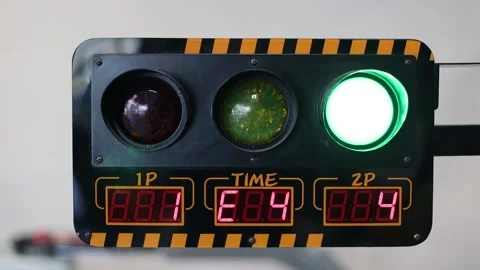 Traffic lights on the children's game machine Stock Footage 220554260