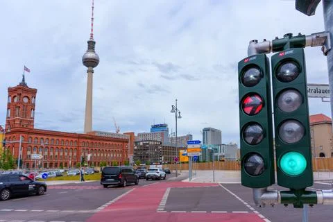 Traffic Lights at Intersection with Berlin TV Tower and Red Town Hall Stock Photos
