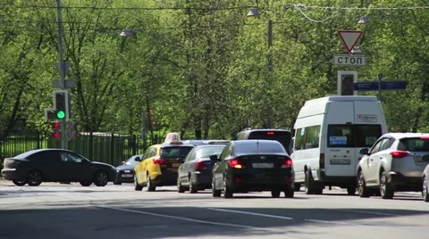The traffic lights at the intersection. The movement of cars Stock Footage 52964828