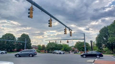 Traffic Lights Over Busy Intersection Stock Photos