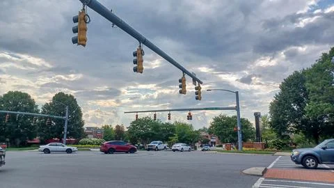 Traffic Lights Over Busy Intersection Stock Photos