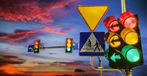 Traffic lights over urban intersection. Traffic lights over urban intersec... Stock Photos