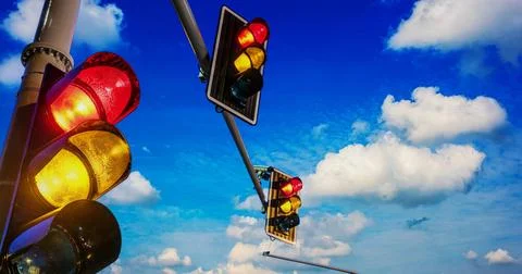 Traffic lights over urban intersection Traffic lights over urban intersect... Photos
