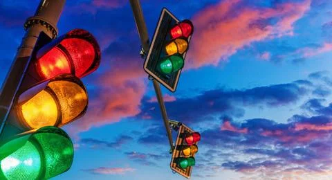Traffic lights over urban intersection Traffic lights over urban intersect... Photos