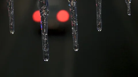 Traffic lights reflected in the formation of icicles Stock Footage 101862370