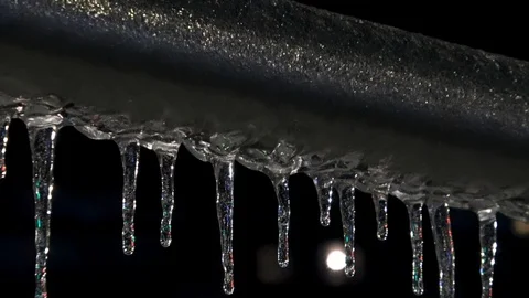 Traffic lights reflected in the formation of icicles Stock-Footage 101862714