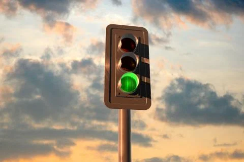 Traffic lights at sunset Stock Photos
