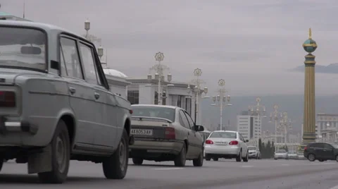 Traffic on main avenue in Ashgabat, Turkmenistan Stock Footage