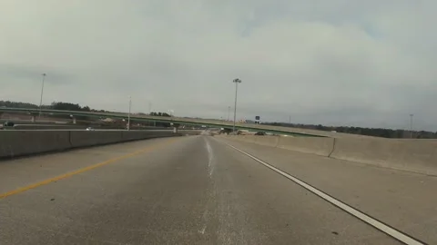Traffic at a major interchange bridge at Bobby Jones and Interstate 20 POV dr Stock Footage 149383229