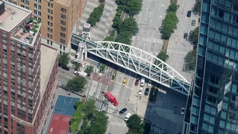 Traffic in Manhattan with Footbridge Stock Footage
