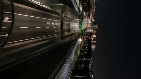Traffic on the Motorways at Night (Vertical | Timelapse | Panning): Tokyo, Japan Stock Footage 169770127
